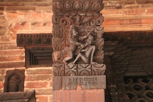 A carving depicting the punishment atTadhuchhen bahal
