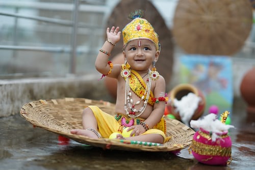 Child representing Lord Krishna Clicker babu