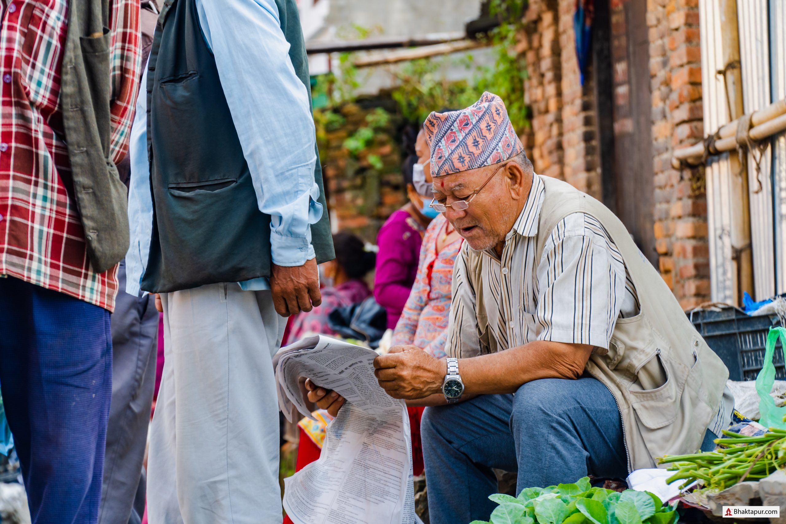 Old age man reading newspaper image