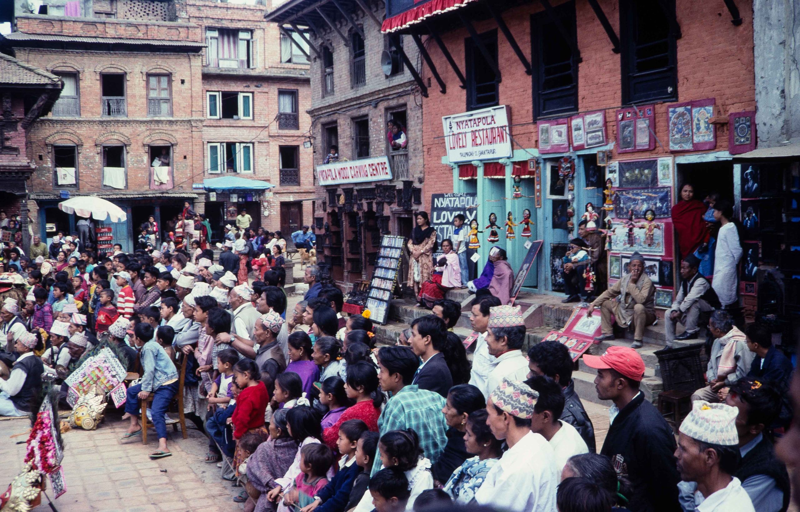 People watching Mahakali Naach in front of Nyatapola temple image